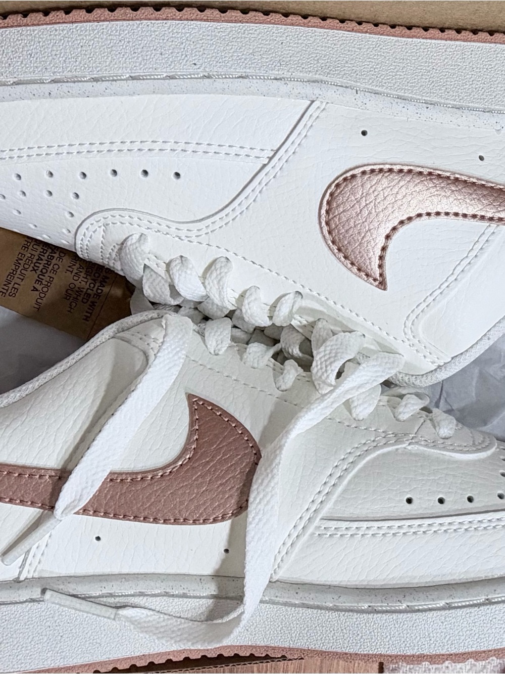 Nike Women's White Sneakers with Rose Gold Swoosh